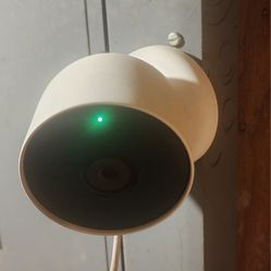 Google Nest Security Camera With Google Hub And Outdoor Cord.