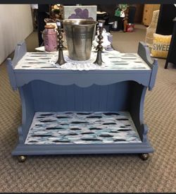 Freshly painted unique table on wheels! 31”W 17” D 25.5” H
