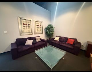 Living room set with a glass table