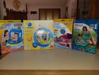 4 NEW IN BOX CHILDREN'S FLOTATION DEVICES. PICK UP MIDDLEBORO ONLY. NO NOT SELLING SEPARATE.