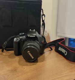 Canon EOS Rebel T3 DSLR Camera + 18–55mm Lens