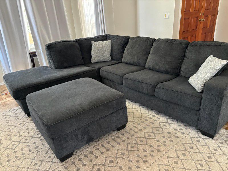 Sectional With Recliner And Ottoman 