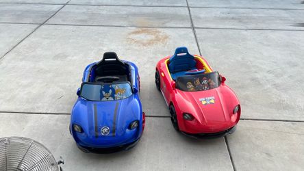 Kids paw patrol and sonic driving cars