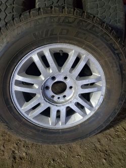 A set of 4 rims and tires 6 lug  275/65R18