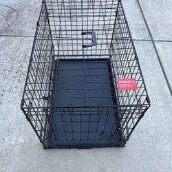 21” Tall 18” Wide 29.5” Long Dog Crate  Used a few times. Dogs got too big too fast.