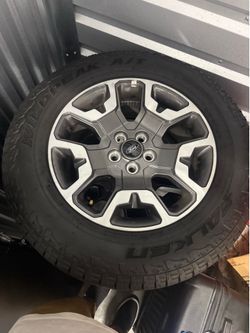 Ford Maverick wheels with tires 5x108