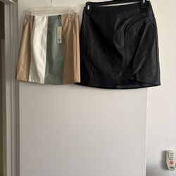 Two new adorable leather skirts size Xs  Beautiful Abercrombie &fitch black skirt and elegant Francesca’s beige, green,and white skirt $15 Each