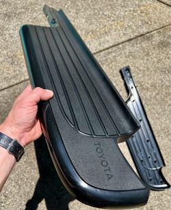 Pair of 95-04 Toyota Tacoma OEM rear bumper step pads