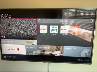 LG  55” TV w/wall mount