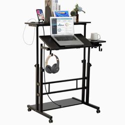 SIDUCAL Mobile Stand Up Desk, Adjustable Laptop Desk with Wheels, Storage Desk Home Office Workstation with USB Ports and Outlets, Rolling Table Lapto