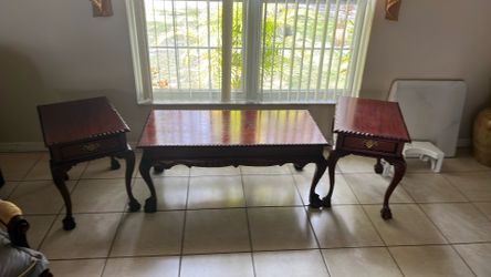Cherry wood. coffee table with two side tables