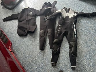 5 Mil Wetsuits Both Never Used