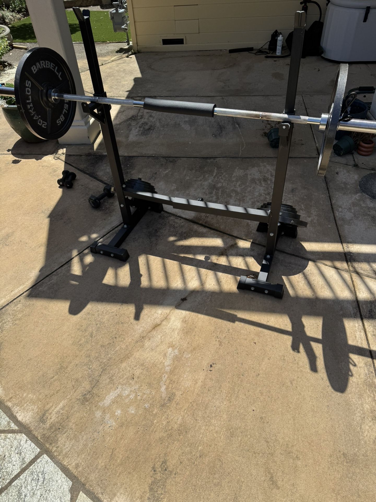 Olympic Weight Plates, Barbell, and Rack