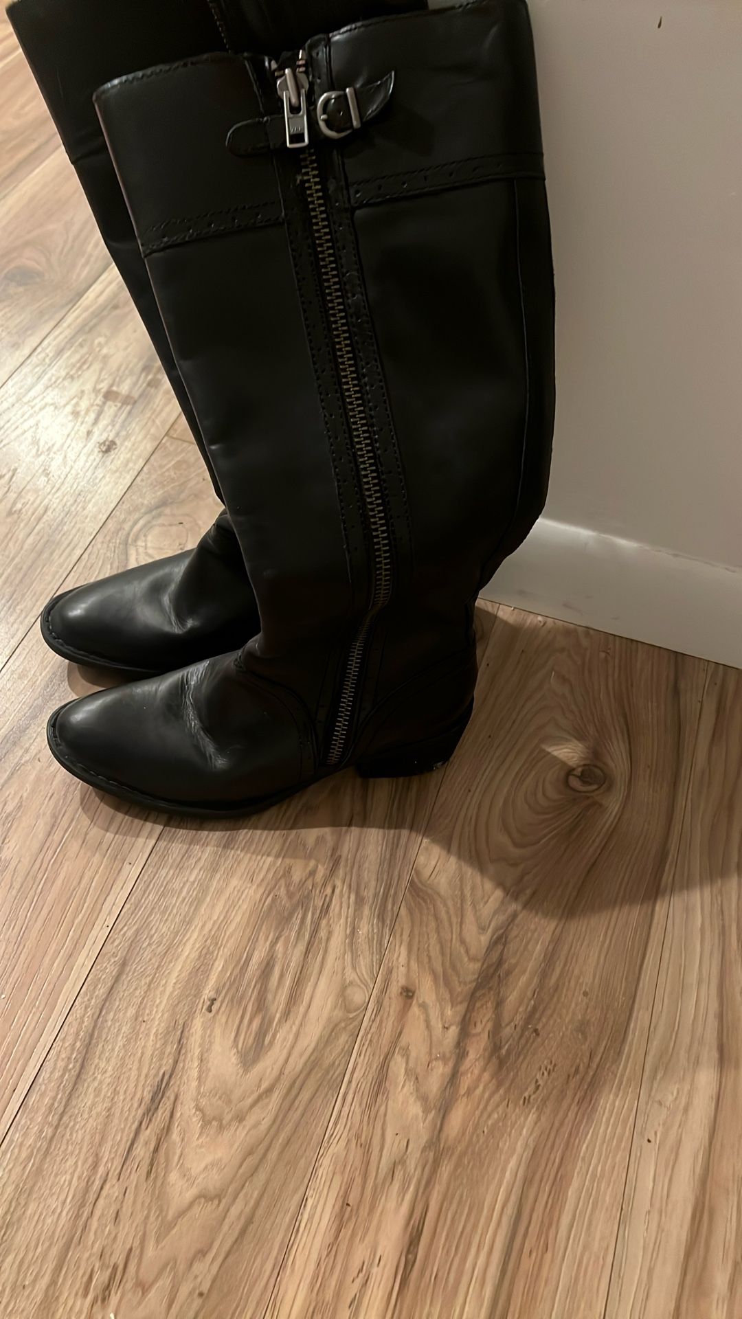 Born black leather, knee-high boots