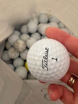 98 Titleist golf balls with 2 free golf balls