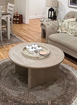 Round  coffee table with matching side table