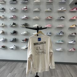 brand new KAWS x Uniqlo Longsleeve Sweatshirt Off White multiple sizes