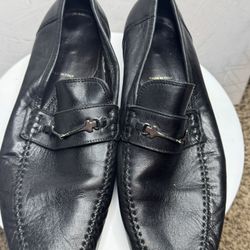 These are men's black leather loafers by M by Bruno Magli 