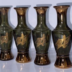 Mid-Century Modern green smoked glass bud vase, likely produced by Wheatonware in the 1960s