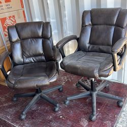 Two swivel office chairs
