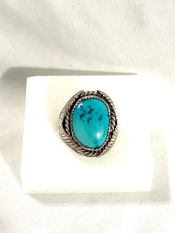 Vintage great condition large turquoise stone set in a .925 silver ring. Size 9.5