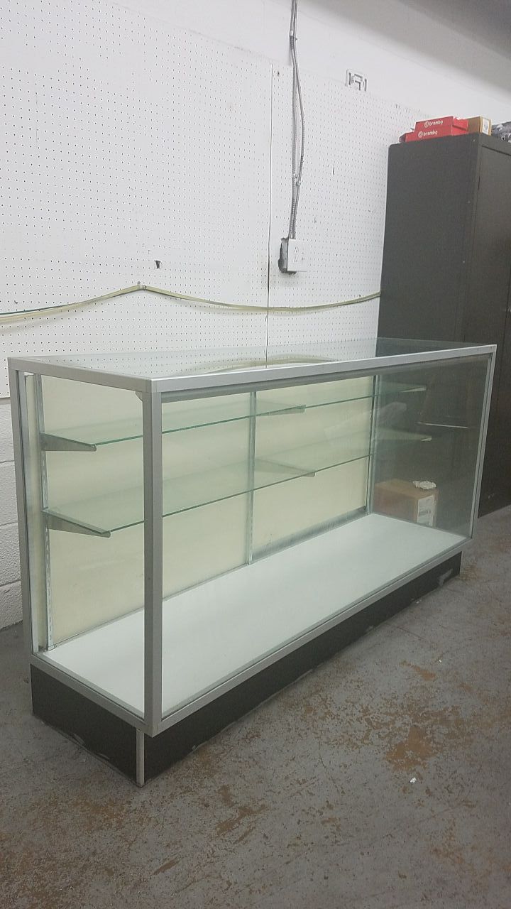 Glass and aluminum frame display with light