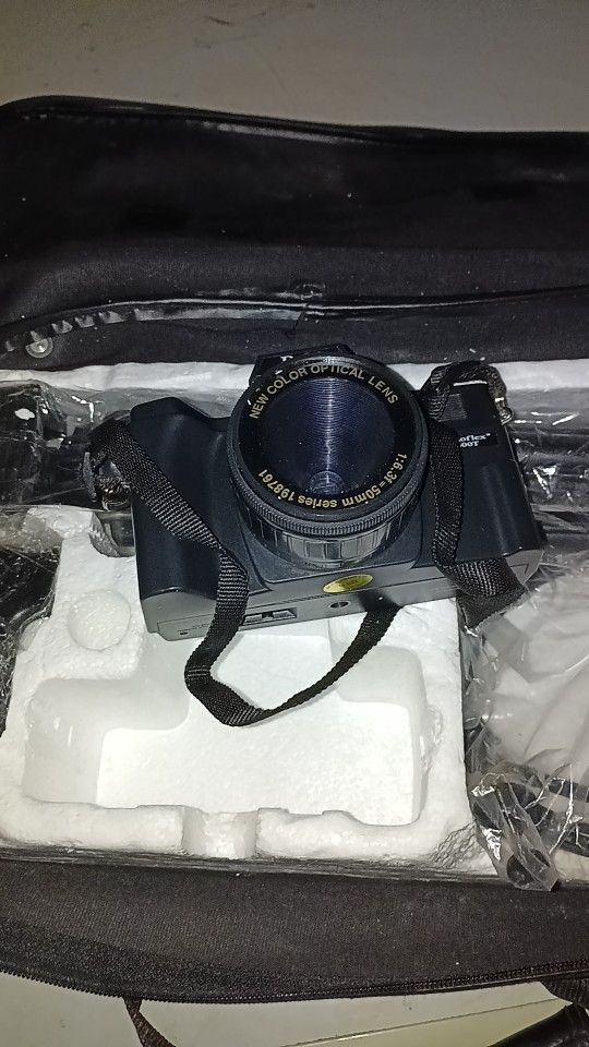 Camera And Bag And Tripod Etc.