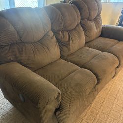 brown fabric three seater sofa 