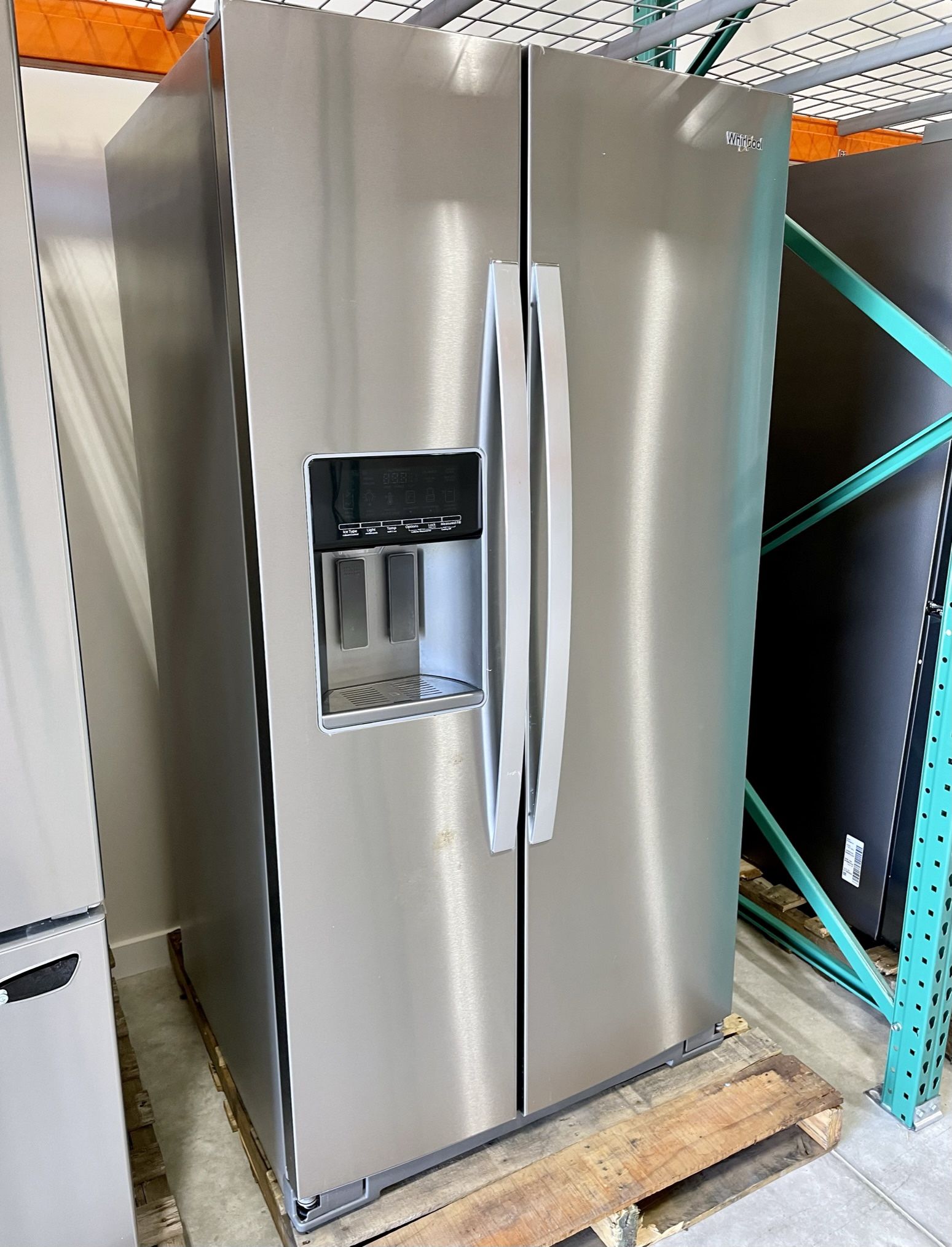 Whirlpool 28 cu. ft. SidebySide Refrigerator with Water Dispenser for