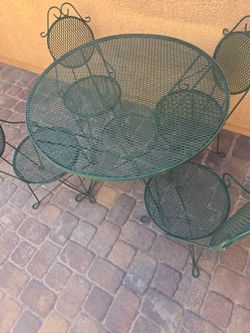 Metal patio table four chairs great shape