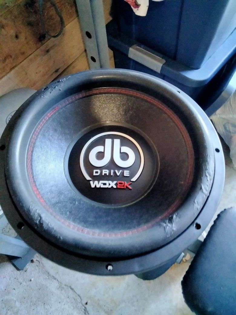15inch DB Drive WDX2K 4ohm $60 Obo will also throw in the other woofer for free one coil is out on one side.