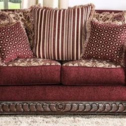 Red Couch With All Of The Pillows 