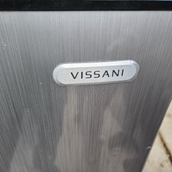 Vissani Mini refrigerator with freezer,
and stand.