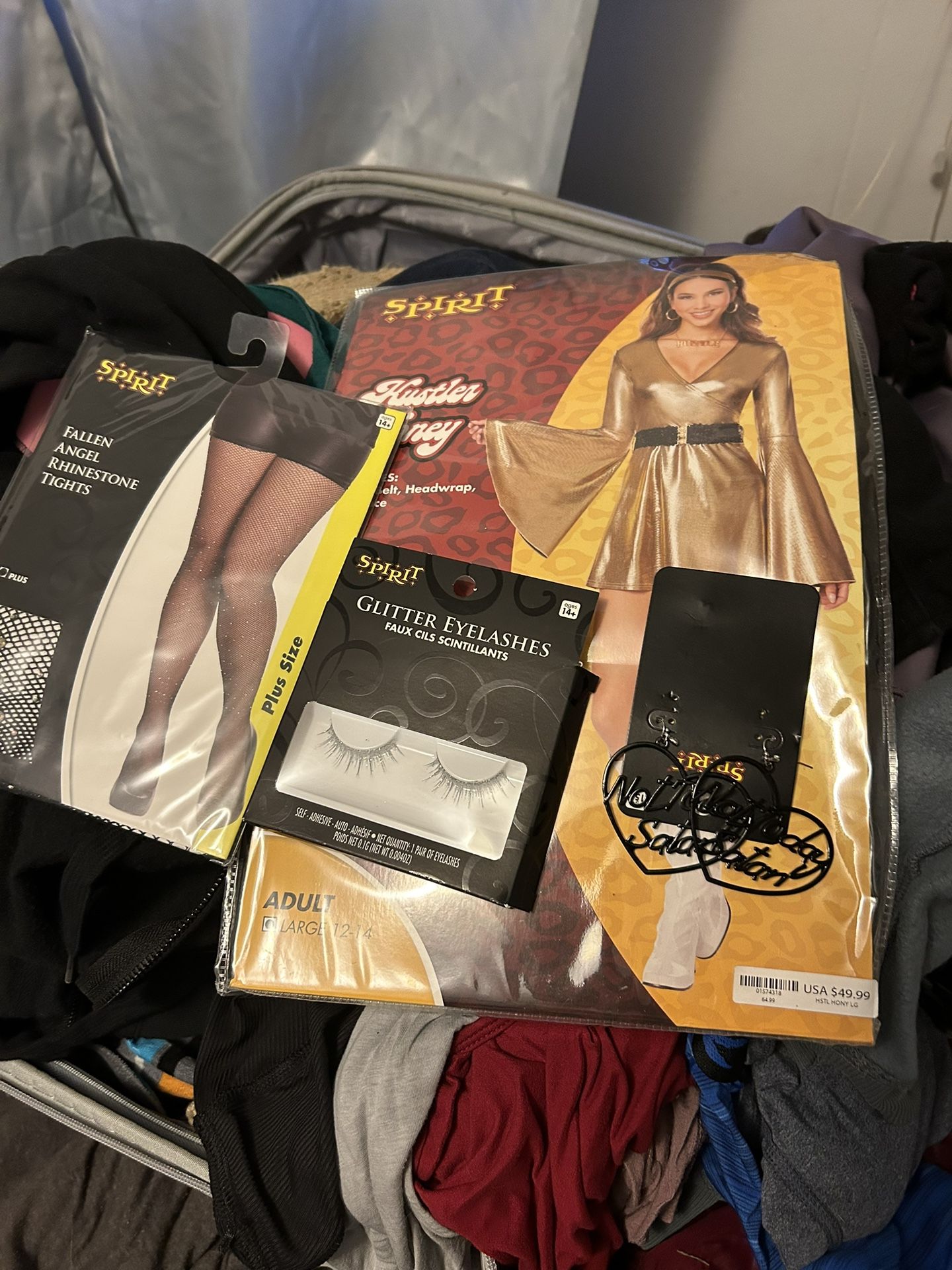 Extra large costume, fishnet, stockings, glitter, lashes, heart earrings