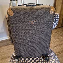 Michael Kors carry on hard shell 