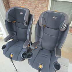 Two Chicco Harness and Booster Seats