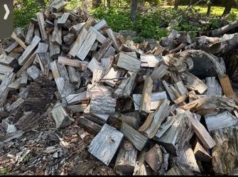 Selling split firewood by  wheelbarrow $15 each one