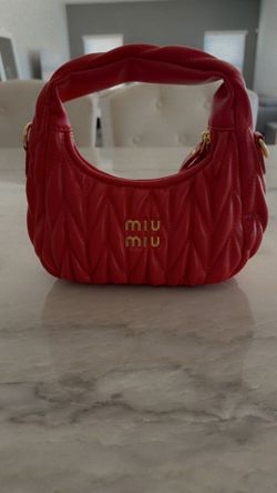 miu miupurse $100