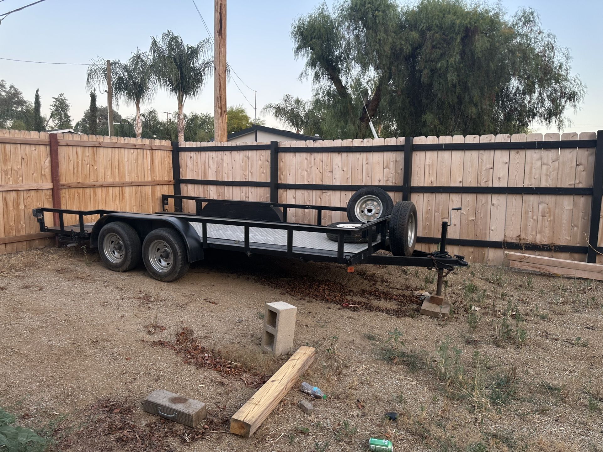 Aztec 16 by 6’4” flatbed trailer tandem axle great condition, great tires, spare and ramps