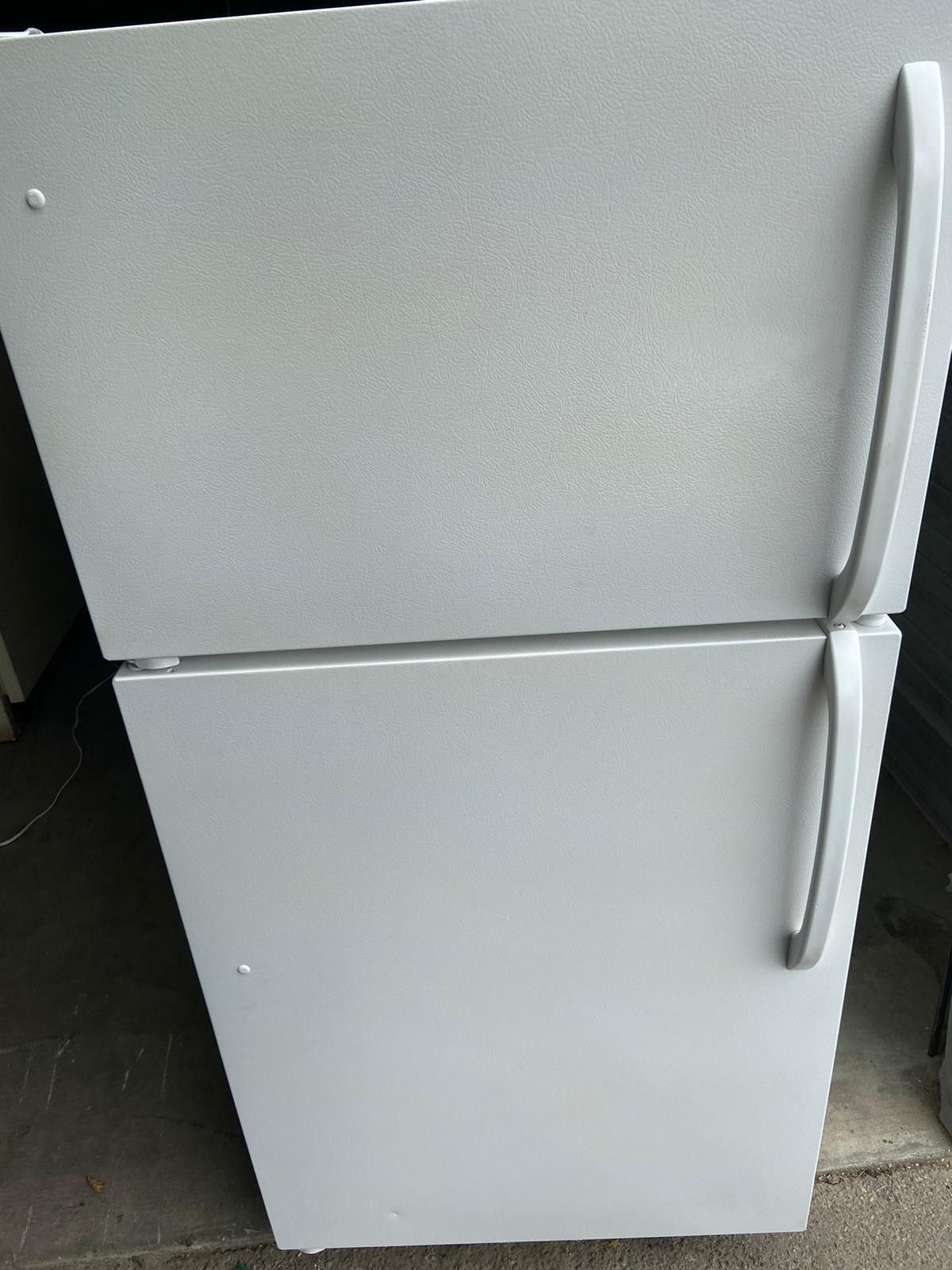 **Frigidaire Apartment Size Refrigerator. Works great(willing to deliver for free