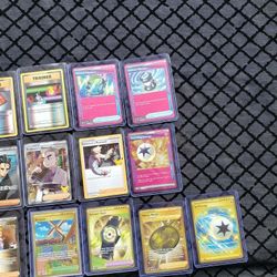 Trainer Pokémon cards some gold Pokémon cards some NBA Stamp some pink Cards selling By Lot $444 all or best offer $30! Each