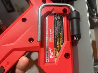Milwaukee bandsaw with charger and 6.0 battery