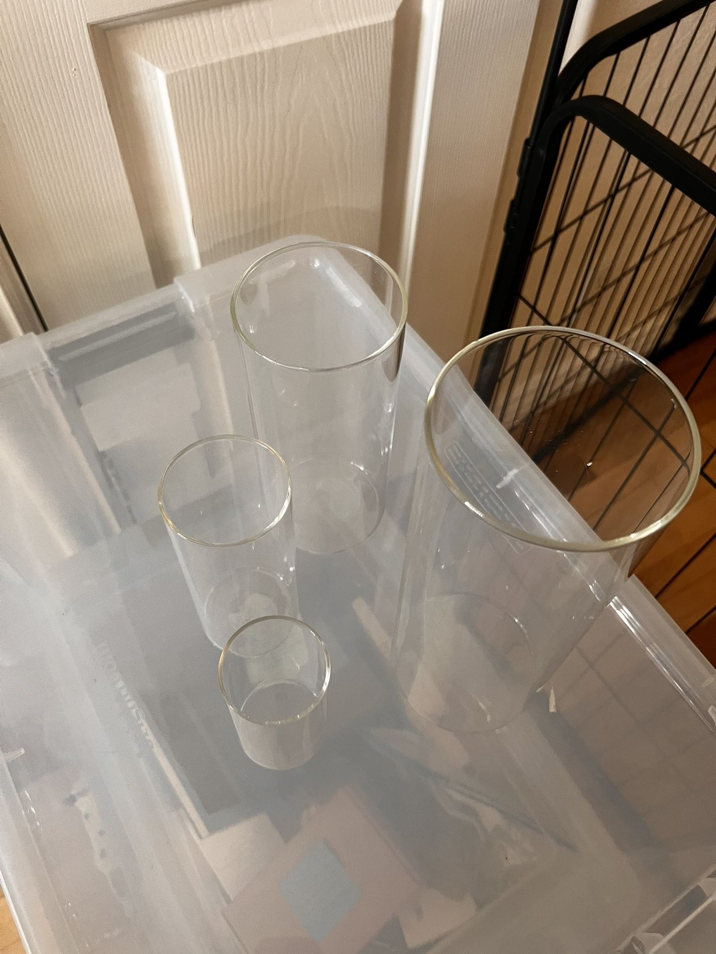 Glass hurricane Vases (16 total, 4 sets of 4) – $80 all