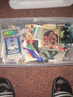 A whole box of baseball ,NASCAR, golf cards .