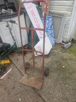 Red Metal Hand Truck Dolly.. the price is firm