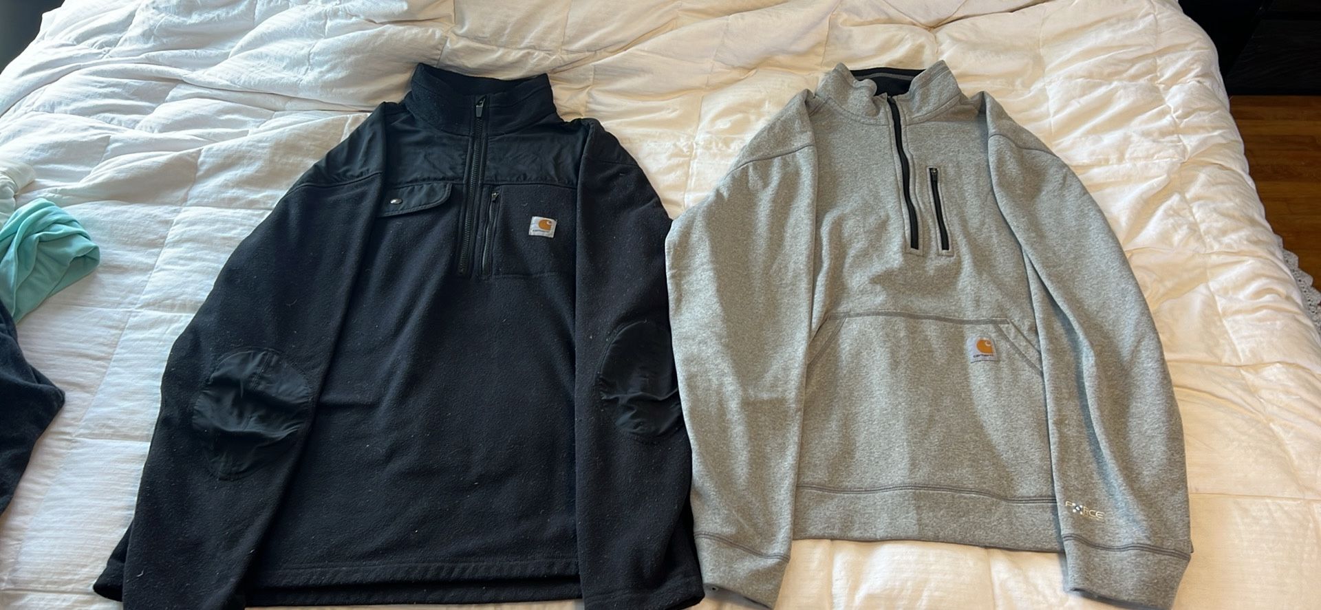 Two Carhart Half Zip Fleece’s Size L