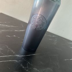 Starbucks tumbler with an iridescent blue sheen. Perfect for daily use.