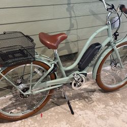 Electra 5i townie go with hydraulic disc brakes and bosch mid drive rear rack with removable basket,color matched fenders, front and rear lights, cafe