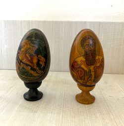 Hand-Painted Russian Orthodox Lacquer Icon Eggs on Matching Turned Wooden Stands – Set of 2