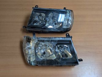 98-05 Toyota Land Cruiser FJ100 Black Headlights